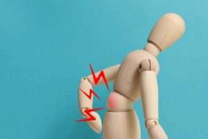 figure bending due to back pain